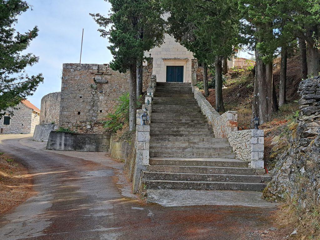 Stone steps leading up to the chapel above Pitve