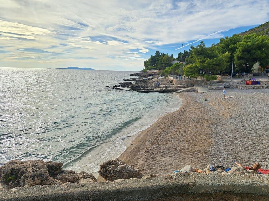 Pebble beach and shallow water at Ivan Dolac