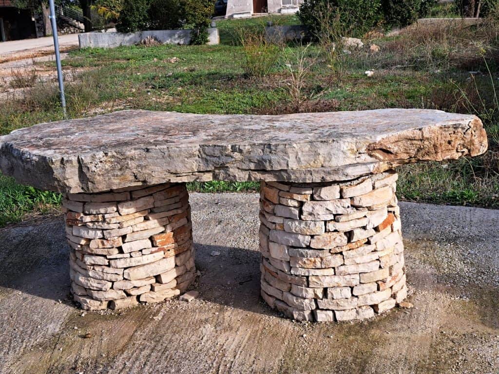 Old stone table on dry-stone supports in Poljica