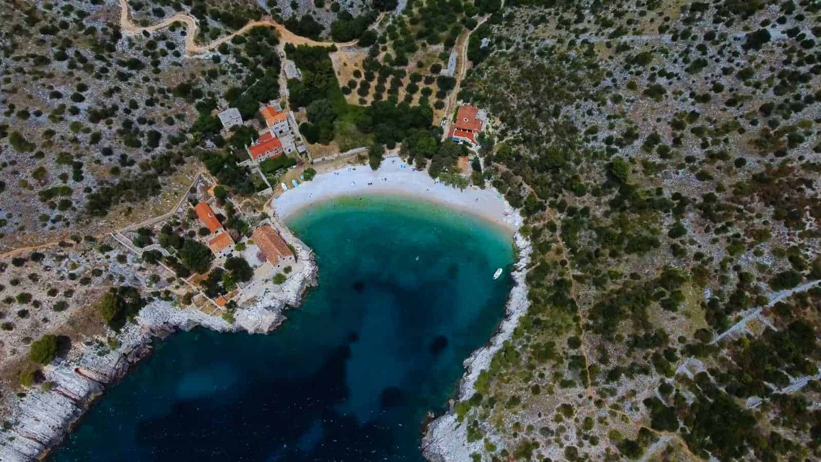 Dubovica beach on the south coast of Hvar, with its single stone house and pebble shore