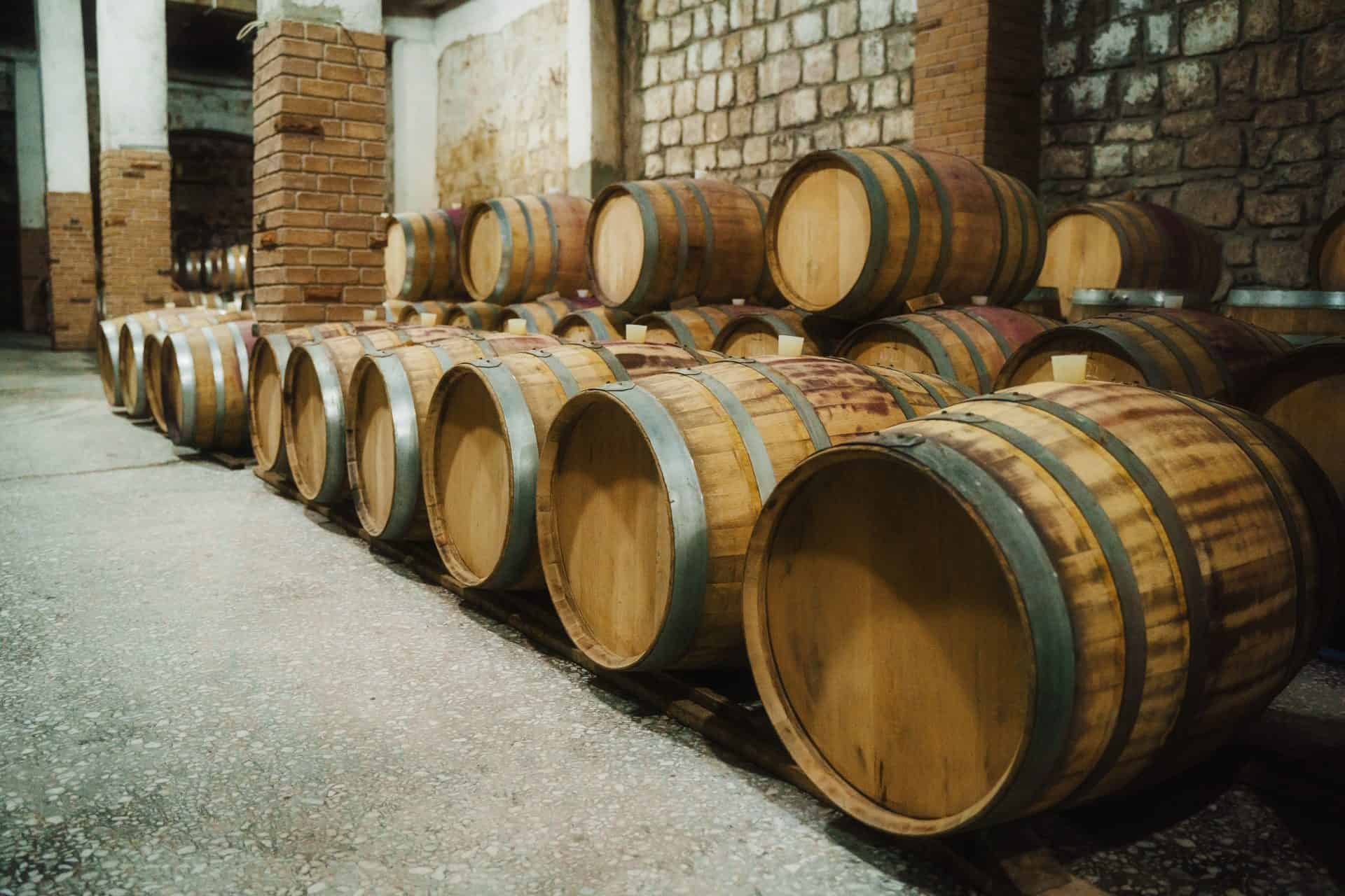 Wine barrels in a stone cellar