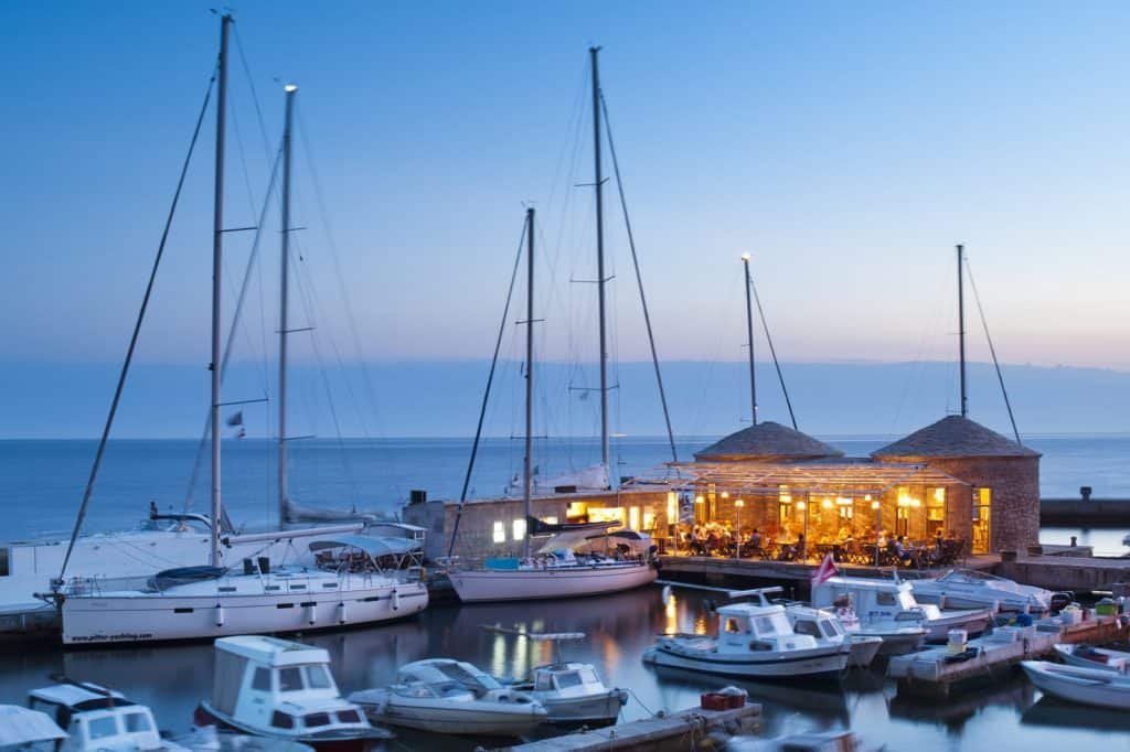 The Zlatan Otok marina restaurant at dusk